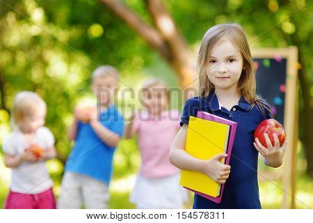 Excited Little Schoolgirl Going Back To School
