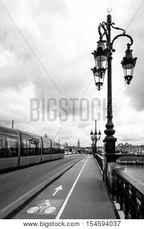 Old stony bridge in Bordeaux, France Europe