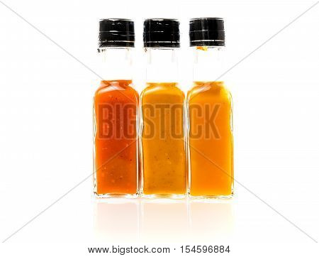 Different Color Home Made Hot Sauce In Glass Bottles