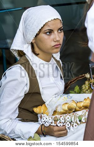 QUARTU S.E., ITALY - September 17, 2016: Parade of Sardinian costumes and floats for the grape festival in honor of the celebration of St. Helena. - Sardinia