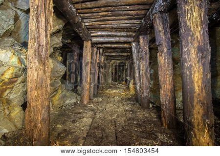Old abandoned gold ore mine tunnel in Ural