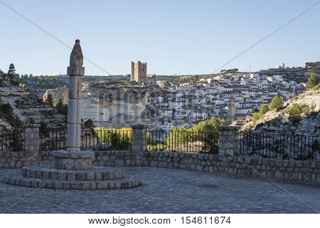 Alcala del Jucar Spain - October 29 2016: Panoramic view of the city on top of limestone mountain is situated Castle of the 12TH century Almohad origin take in Alcala of the Jucar Albacete province Spain