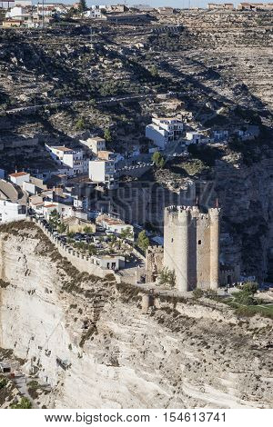 Alcala del Jucar Spain - October 29 2016: Panoramic view of the city on top of limestone mountain is situated Castle of the 12TH century Almohad origin take in Alcala of the Jucar Albacete province Spain