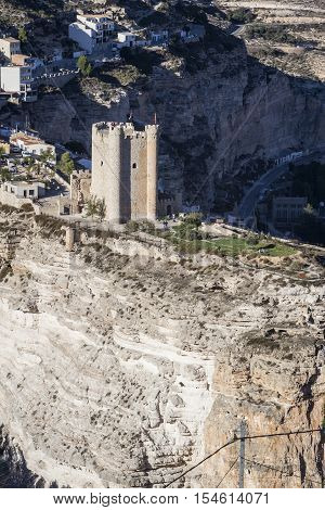 Alcala del Jucar Spain - October 29 2016: Panoramic view of the city on top of limestone mountain is situated Castle of the 12TH century Almohad origin take in Alcala of the Jucar Albacete province Spain