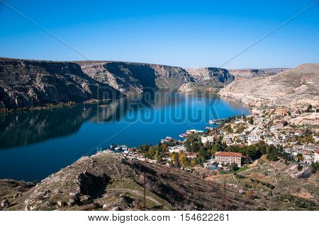 Gaziantep, Turkey - December 08, 2014: Historical village and castle at birecik dam of halfeti