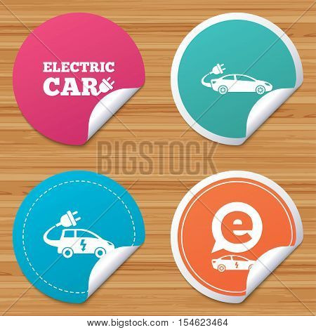 Round stickers or website banners. Electric car icons. Sedan and Hatchback transport symbols. Eco fuel vehicles signs. Circle badges with bended corner. Vector