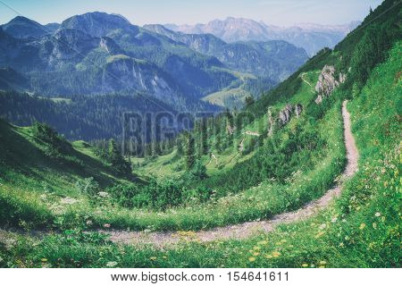 Beautiful view from top of cableway above the Konigsee lake on Schneibstein mountain ridge. Border of German and Austrian Alps, Europe. Toned like Instagram filter