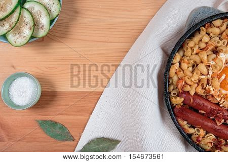 Delicious pasta with egg and green apple