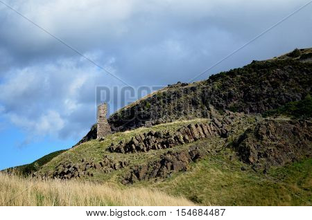 Stone ruins of Anthony's chapel from the base of Arthur's Seat.