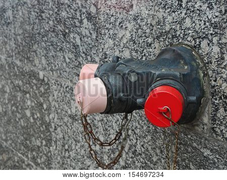 Metal standpipe on the public street for firefighter.