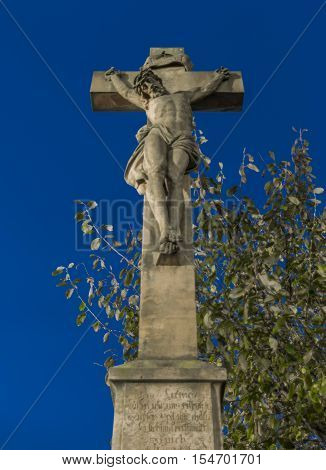 Crucifix near church in Krasna Lipa town in north Bohemia