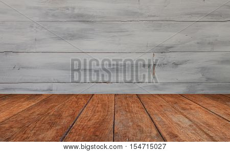 Perspective table top with white wooden wall background, stock photo