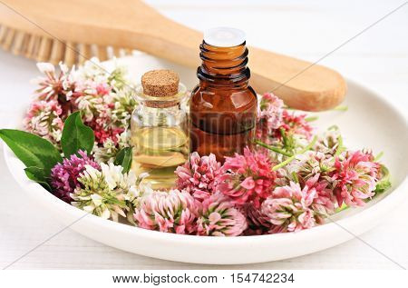 Red clover extract and aroma essenial oil for natural cosmetic haircare treatment.