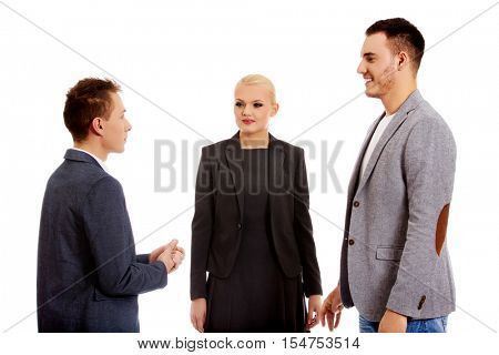 Happy business team talking together 