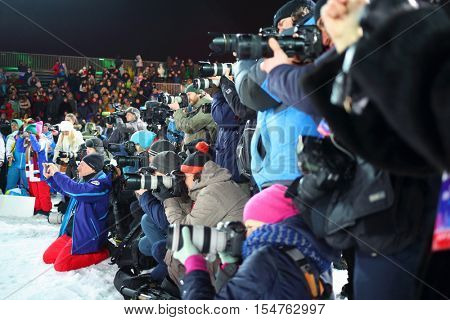 MOSCOW - FEB 13, 2016: Photographers at World Cup FIS Freestyle at night in Krylatskoye