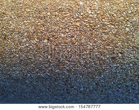 Pebble stones with curve shape.Texture background and shadow