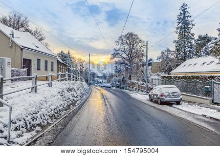 Village Of Grinzing In Early Morning Light In Wintertime