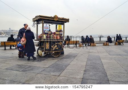 Istanbul Turkey - February 21 2013: Istanbul Eminonu pickle vendor. Traditional Turkish pickles of various fruits and vegetables. There is an important place in Turkey and produced first by the Turks.