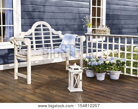 Garden with sofa for a wooden house