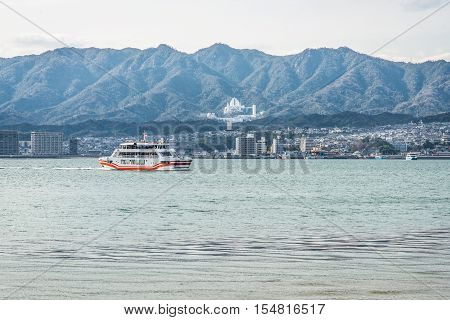 Ferry-boat in island of Miyajima - Hiroshima Japan. View from the Miyajimaguchi city pier