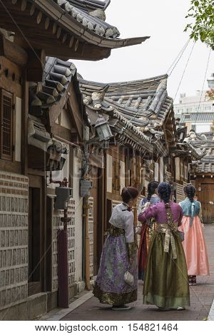 Seoul - South Korea - October 21, 2016 : A Couple Women Wander Through The Traditional Style Houses