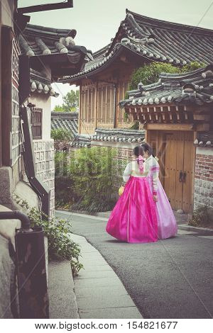 Seoul - South Korea - October 21, 2016 : A Couple Women Wander Through The Traditional Style Houses