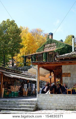 METSOVO VILLAGE GREECE-OCTOBER 11: The tourists enjoing their vacation in Metsovo village on October 11 2013 in Metsovo Greece. Up to 12 mln tourists is expected to visit Greece in year 2013