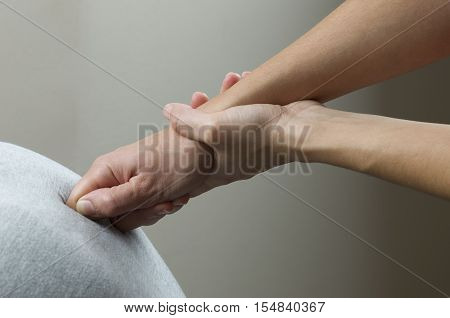 Chiropractor Is Doing A  Office Massage On Chair