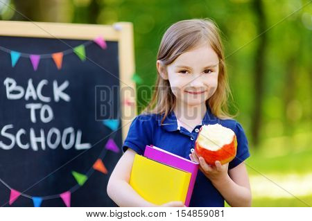 Adorable Little Schoolgirl Is Going Back To School