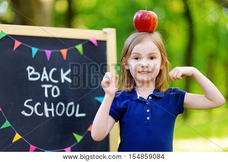 Adorable Little Schoolgirl Is Going Back To School