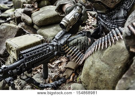 United states army ranger machine gunner in the forest