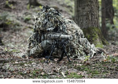 United states army ranger sniper wearing ghillie suit