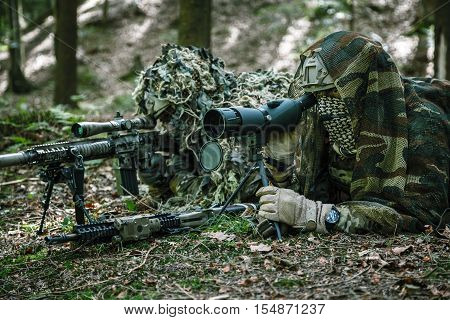 United states army rangers sniper pair in the forest