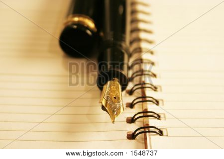 Pen på en Notebook
