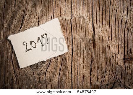 Happy New Yera 2017 On Rustic Wooden Background