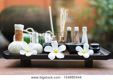 Spa massage compress balls herbal ball on the wooden with treaments spa Thailand select focus