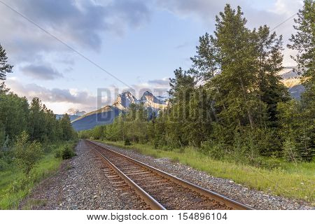 Train Tracks And The Rocky Mountains- Canmore, Alberta