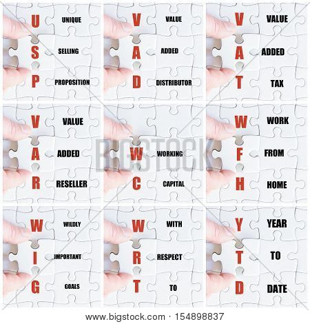 Hand Of Business Man Completing The Puzzle