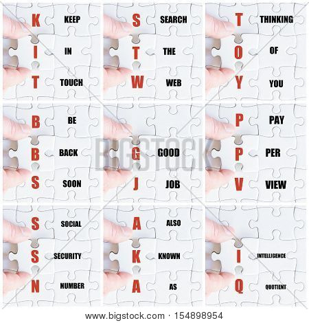Hand Of Business Man Completing The Puzzle