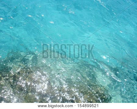 Sunlight reflection in the blue tropical ocean water