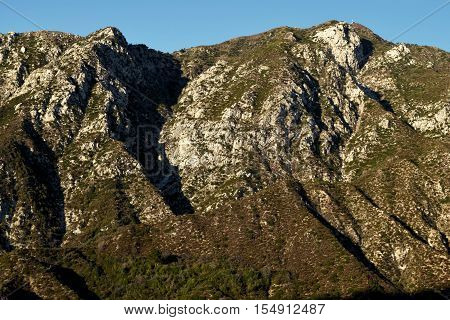 Mountains with an arid chaparral woodland creating a badlands landscape taken in the San Gabriel Mountains, CA