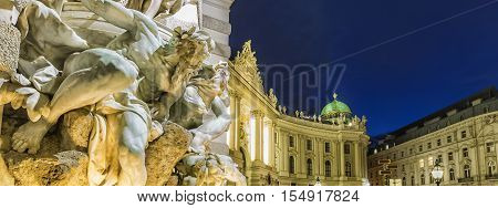 Michaelertrakt Palace, Hofburg In Vienna, Austria. Night View From The Michaelerplatz.