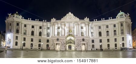 Hofburg Palace Seen From Michaelerplatz, Panoramic Night View.  Vienna, Austria