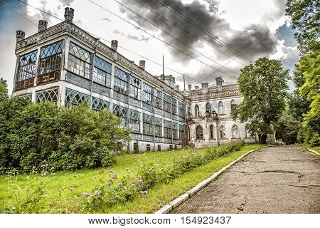 beautiful view of old Sharovsky Castle yard and gray sky, Kharkiv region