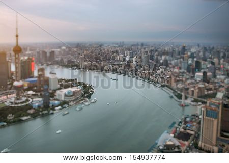 Bird's eye view of the huangpu river of Shanghai from a height of skyscrapers and architecture, China