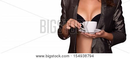 Sexy body of woman holding coffee cup. A coffee cup in the hands of a naked young woman. Isolated on white background.