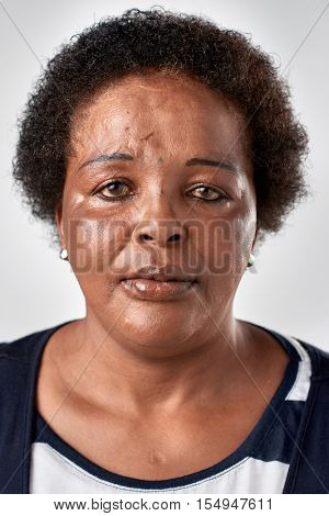 Portrait of real black african woman with no expression ID or passport photo full collection of diverse face and expressions