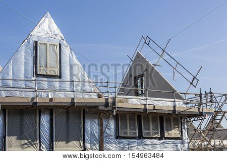 Construction site with houses with prefabricated walls in the Netherlands