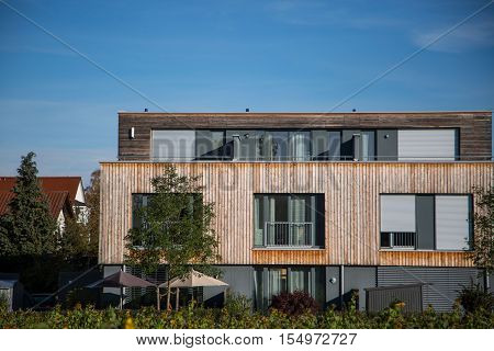 Modern house with wooden cladding - wooden facade wooden house