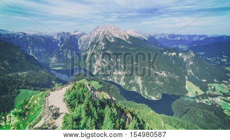 Beautiful view from top of cableway above the Konigsee lake on Schneibstein mountain ridge. Border of German and Austrian Alps, Europe. Toned